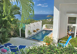 St John Villa Sea Turtle private pool and outdoor seating area on two tiered deck with expansive ocean views