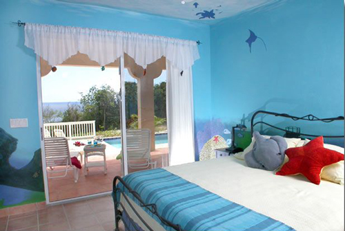 USVI St John rental villa Arco Iris Starfish bedroom with king bed, and private bathroom, overlooking the pool