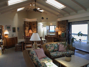 St John USVI Vacation Rental Soft Winds spacious living room, high ceilings with skylights and large sliding doors for expansive views