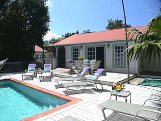 St John Rental Home Tree Tops large sun deck surrounding pool and many places to sun bathe
